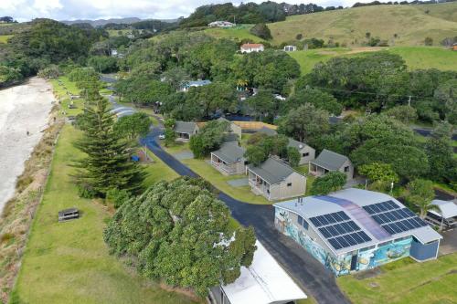 an aerial view of a house with a solarium at Camp Waipu Cove in Waipu