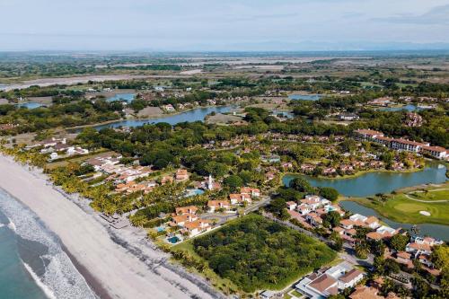an aerial view of a resort next to the beach at The Buenaventura Golf & Beach Resort, Autograph Collection in Playa Blanca