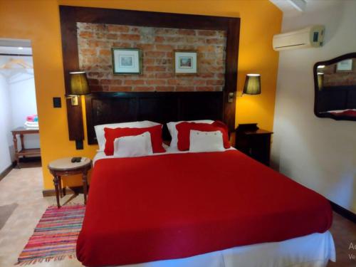 Postel nebo postele na pokoji v ubytování Alonso Chacras Lodge
