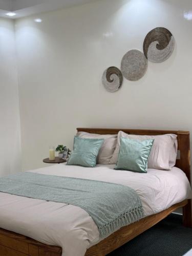 Ένα ή περισσότερα κρεβάτια σε δωμάτιο στο Cozy Beach Apartment in Ngor