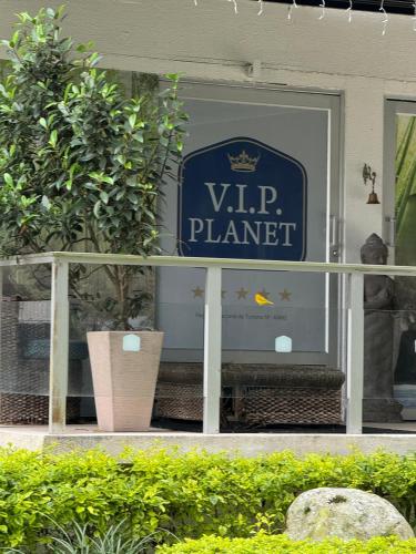 a sign for a vip planner in a store window at VIP planet urban Room in Armenia