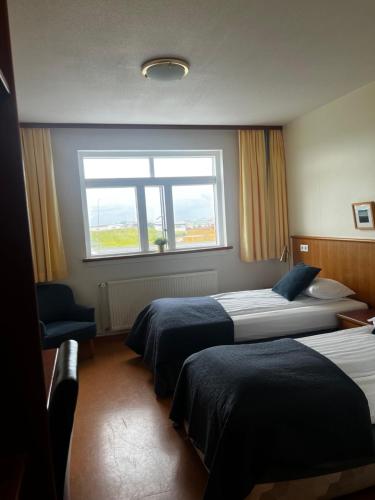 Adventure Hotel Hellissandurにあるベッド
