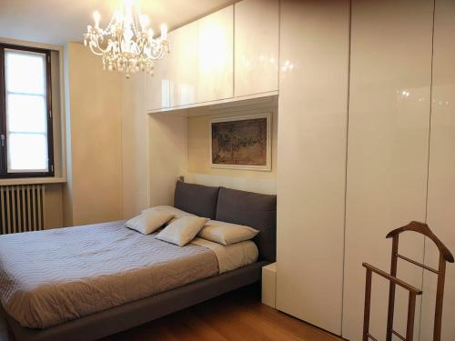 Postel nebo postele na pokoji v ubytování Palazzo Foresi by Strozzi 120m Luxury Apartment