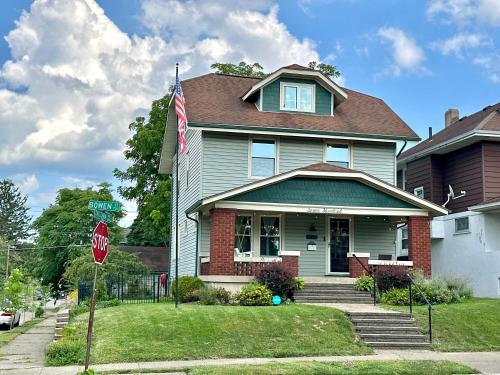 a house with a stop sign in front of it at The Dayton DreamHouse in Dayton