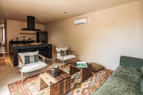 Un lugar para sentarse en Xela Tulum - Member of Design Hotels