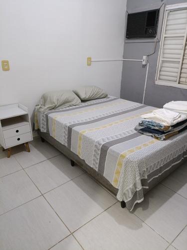 Katil atau katil-katil dalam bilik di Casa com piscina