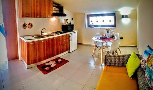 Kuchyň nebo kuchyňský kout v ubytování Residence Cuore