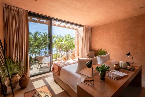 Un lugar para sentarse en Xela Tulum - Member of Design Hotels