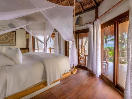Vuode tai vuoteita majoituspaikassa Encantada Tulum