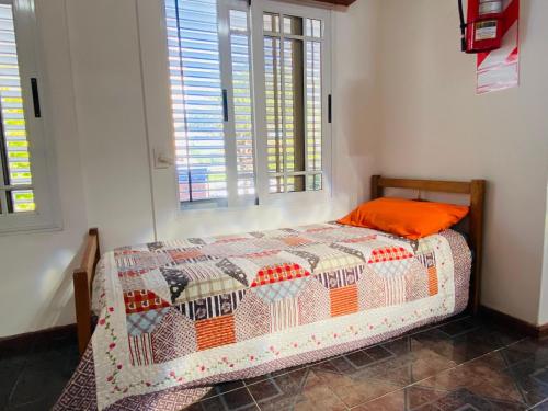 Ένα ή περισσότερα κρεβάτια σε δωμάτιο στο El Atardecer