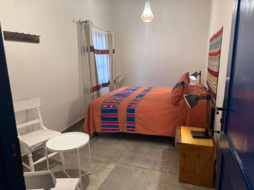 Voodi või voodid majutusasutuse Ckoi Atacama Lodge toas