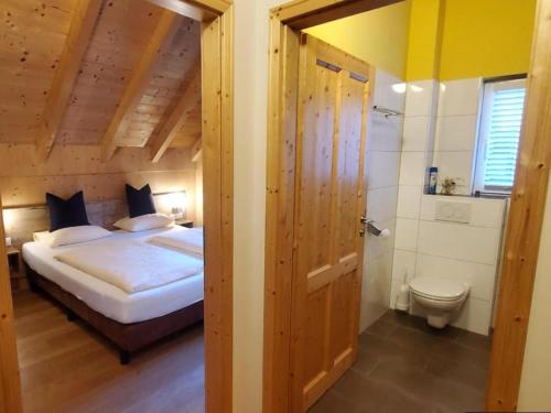 Postel nebo postele na pokoji v ubytování Mur-Chalet St Michael