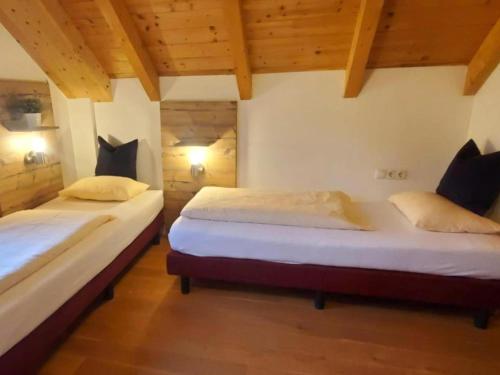 Postel nebo postele na pokoji v ubytování Mur-Chalet St Michael