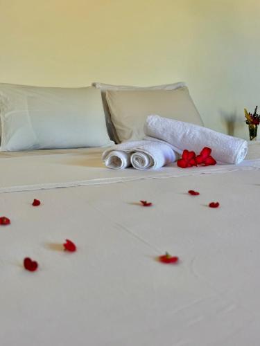 Ένα ή περισσότερα κρεβάτια σε δωμάτιο στο Chalé do Valdecio