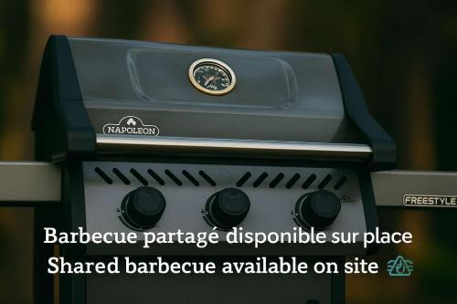 a close up of a stove with a sticker on it at Luxury Retreat with Hot Tub - EV Chrger & Parking in Quebec City