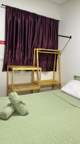 a bedroom with a bed and a window at Pousada Querência Porto de Galinhas in Porto De Galinhas