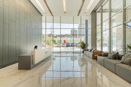 Χώρος καθιστικού στο Distrito 90 Suites