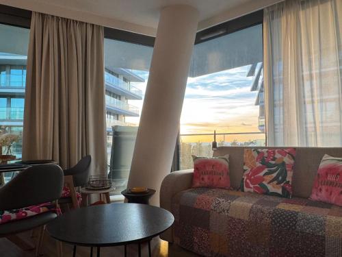 Χώρος καθιστικού στο Baltycki Eden Apartment Delux