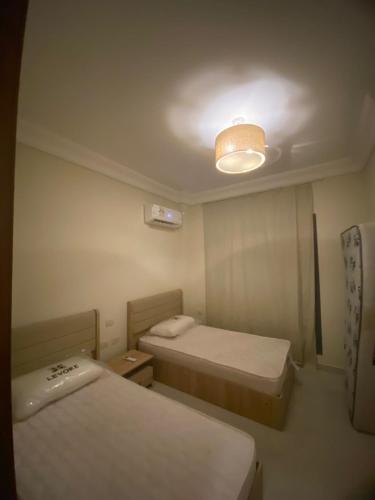 Ένα ή περισσότερα κρεβάτια σε δωμάτιο στο Lavsita ras al hikma