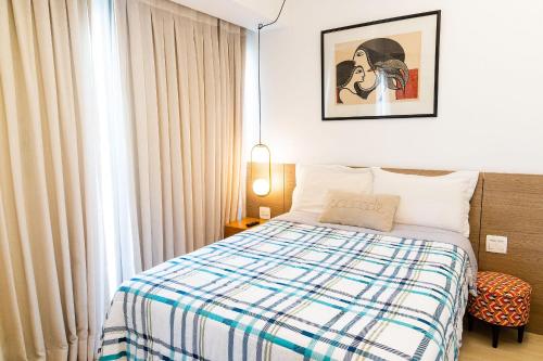 Postel nebo postele na pokoji v ubytování Condomínio Edificio Miramar