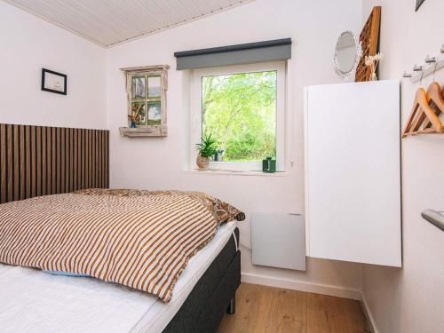 Postel nebo postele na pokoji v ubytování 7 person holiday home in Hurup Thy-By Traum