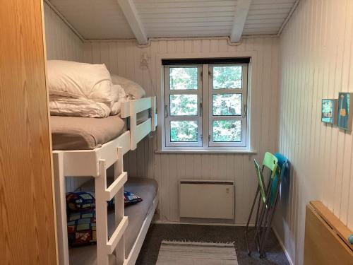 Una cama o camas en una habitación de Sauna Retreat in Blabjerg - By Traum Ferienwohnungen