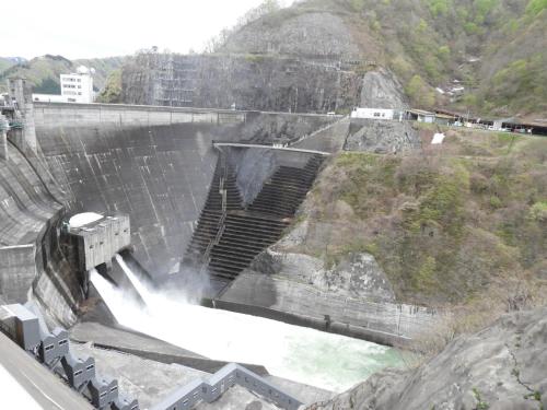 a dam with water coming out of it at せせらぎの宿吉野屋 in Nishiwaga