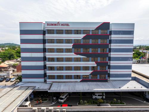 a large building with a santa marta hotel at Summit Hotel Tacloban in Tacloban