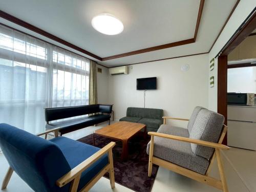 Μια τηλεόραση ή/και κέντρο ψυχαγωγίας στο Guesthouse Sapporo Kita