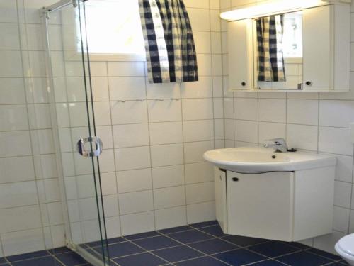 a bathroom with a sink and a shower at 3 person holiday park home, Lærdal in Lærdalsøyri