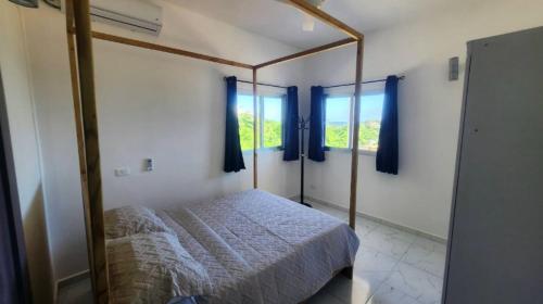 Ένα ή περισσότερα κρεβάτια σε δωμάτιο στο Endless Horizon Apartments