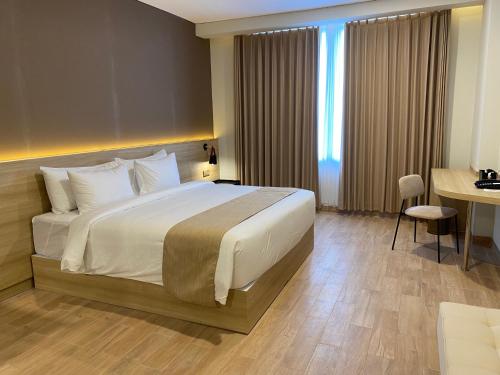 Postel nebo postele na pokoji v ubytování University Hotel UMY