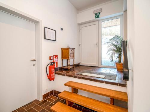 a room with a bench and a window at Holiday home in HUY near town center in Huy
