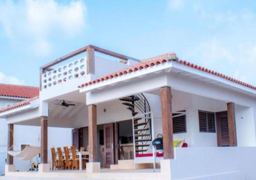 a rendering of a house with a balcony at Villa Caribbean Dream Bonaire in Kralendijk