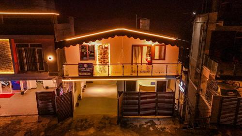 an overhead view of a building at night at Le Karaj Meadows in Lovedale