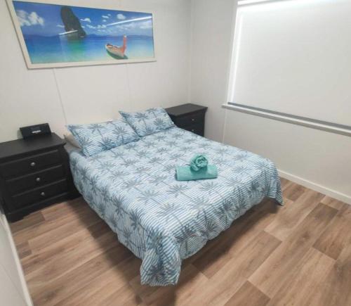 Ένα ή περισσότερα κρεβάτια σε δωμάτιο στο A Golden Barrel