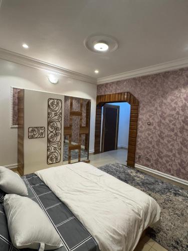 Postel nebo postele na pokoji v ubytování AHIL apartments