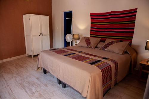 Voodi või voodid majutusasutuse Ckoi Atacama Lodge toas