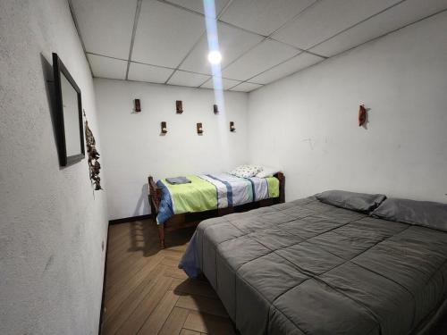 Postel nebo postele na pokoji v ubytování Casa Panorama