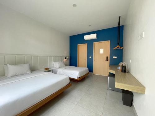 Postel nebo postele na pokoji v ubytování Somatepy Boutique Hotel