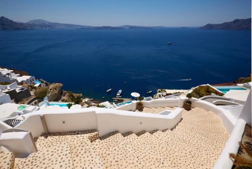 a view of the blue ocean from a resort at Filotera Suites in Oia