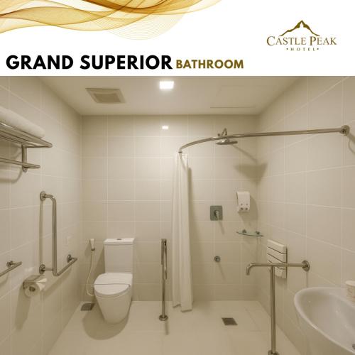 a bathroom with a toilet and a sink at Castle Peak Hotel in Cebu City