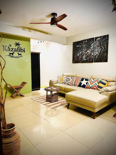 Coin salon dans l'établissement Flic en Flac Beachfront Apartment, KAZAFIBI