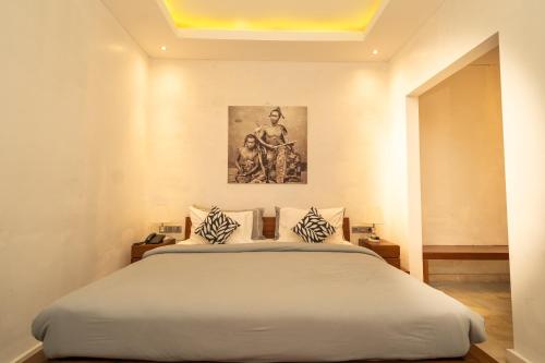 Katil atau katil-katil dalam bilik di Bali Karma Sajtra Hotel