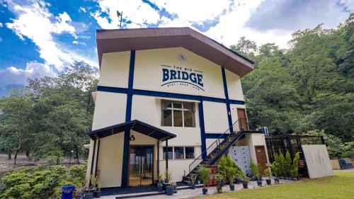 a building with a sign that reads the barride at The Big Bridge- A Boutique Hotel On A Bridge in Rishīkesh