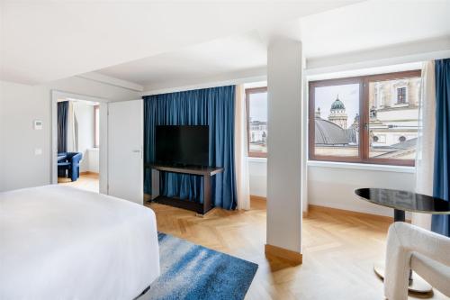 Televisyen dan/atau pusat hiburan di Hilton Berlin