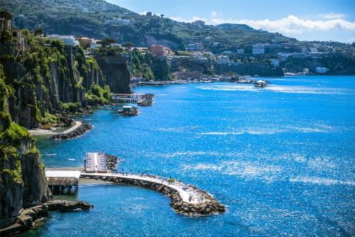 a river with a bridge in the water at Hilton Sorrento Palace in Sorrento