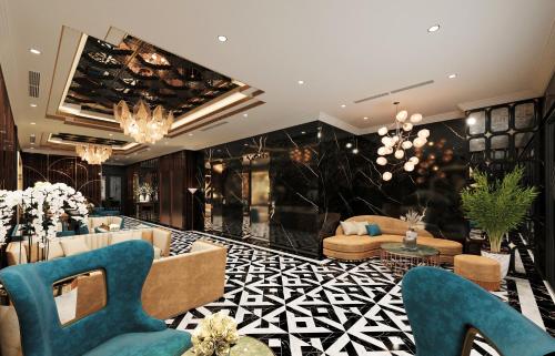 a lobby with chairs and a couch and a table at L'Heritage Premium Hanoi Central in Hanoi
