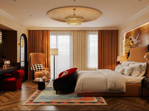 a bedroom with a bed and a chair and a chandelier at L'Heritage Premium Hanoi Central in Hanoi