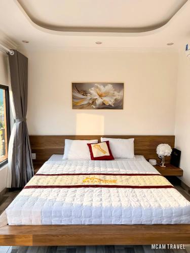 Кровать или кровати в номере Bazan Home Mộc Châu